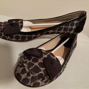 Kate Spade authentic signature design shoes with bow.